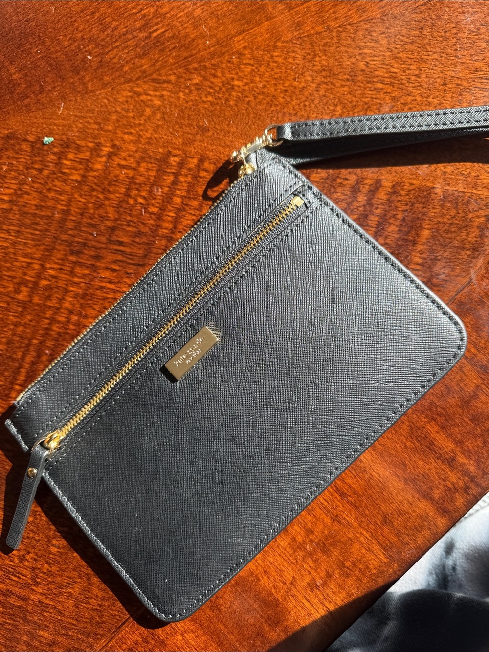 kate spade black leather wristlet with gold hardware